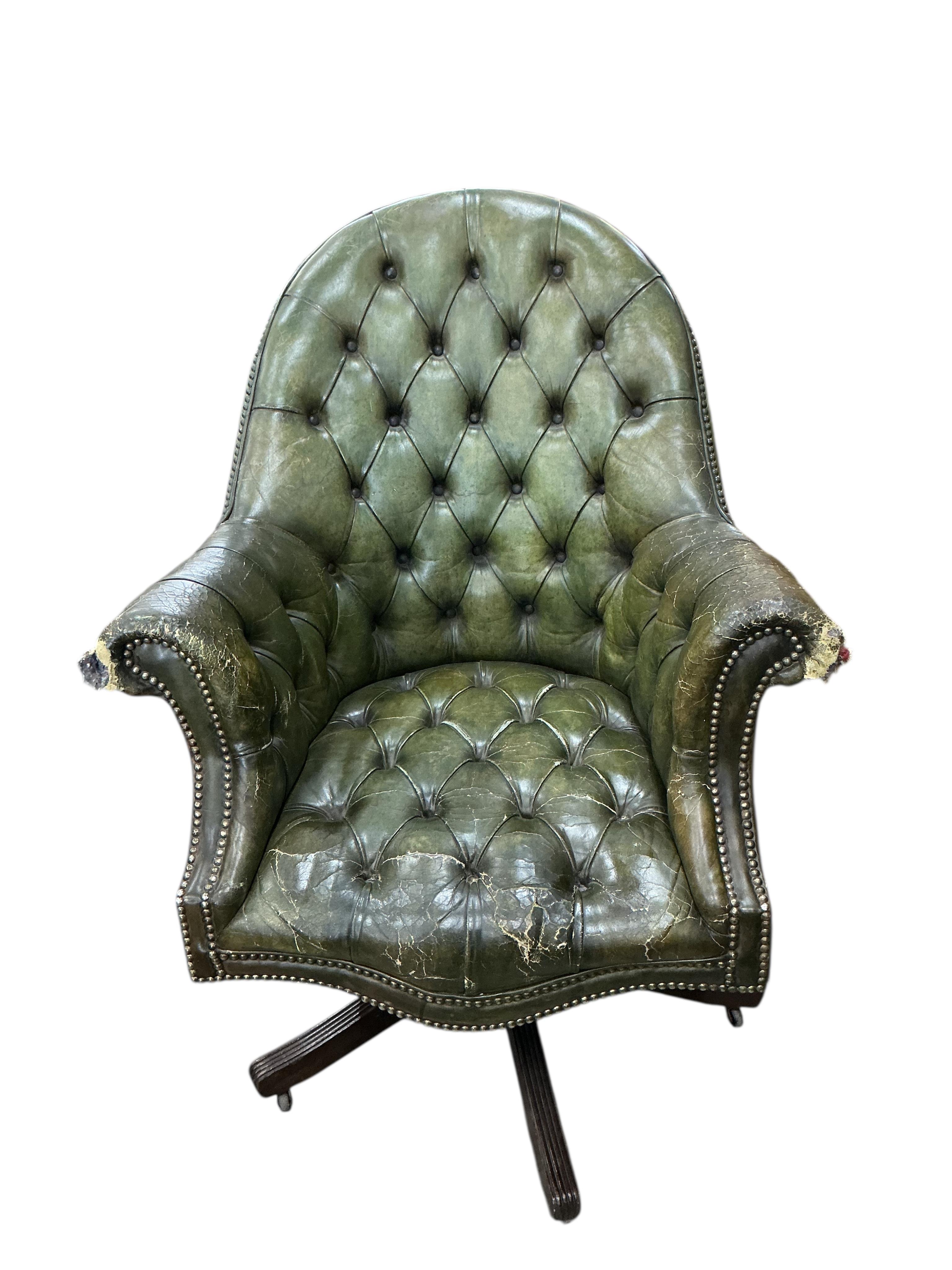 A reproduction George III style mahogany pedestal partners desk, width 180cm, depth 120cm, height 76cm, together with a button green leather swivel desk chair